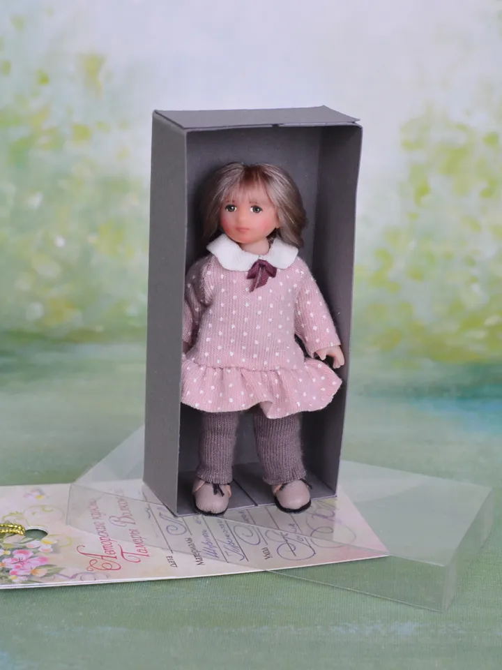 Miniature doll child in 12th scales