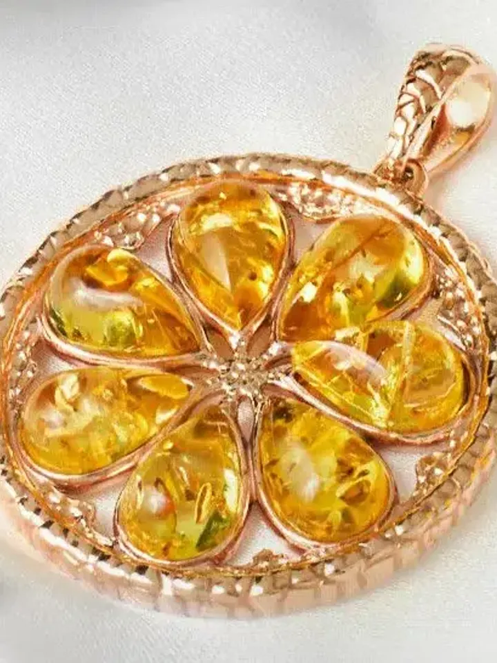 Jewelry pendant Lemons with natural Baltic amber made of 925 silver