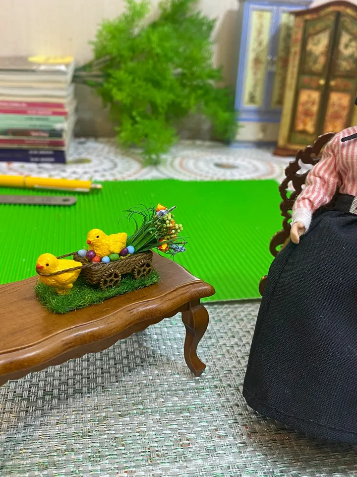 Easter miniature. Two chickens with a cart and a bouquet of flowers.1:12