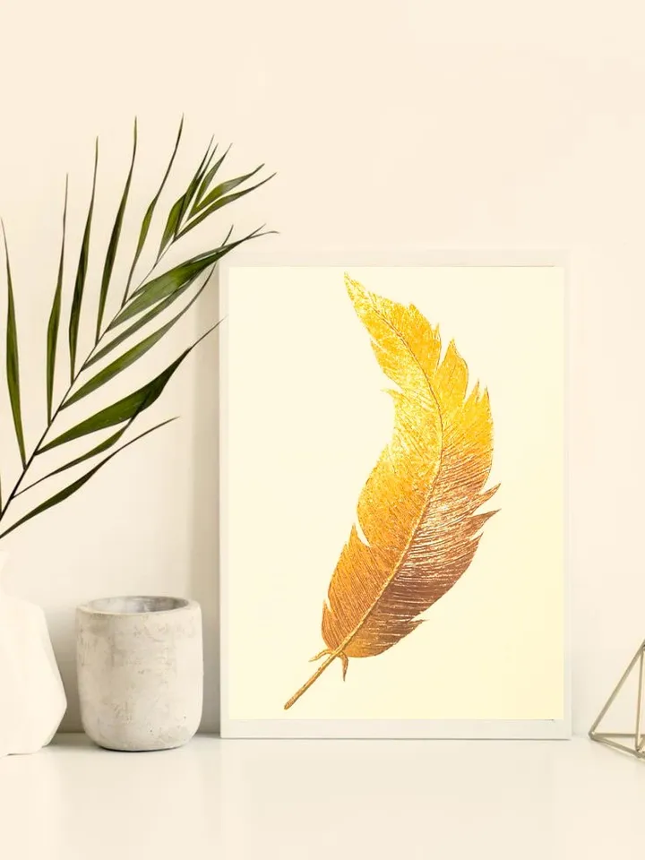 “Golden Feather on a White Background” is a painting that will add luxury to your interior