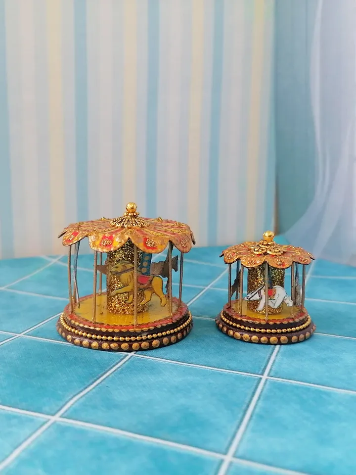 Miniature dollhouse carousel with gold trim. 1:12. Dollhouse miniature.