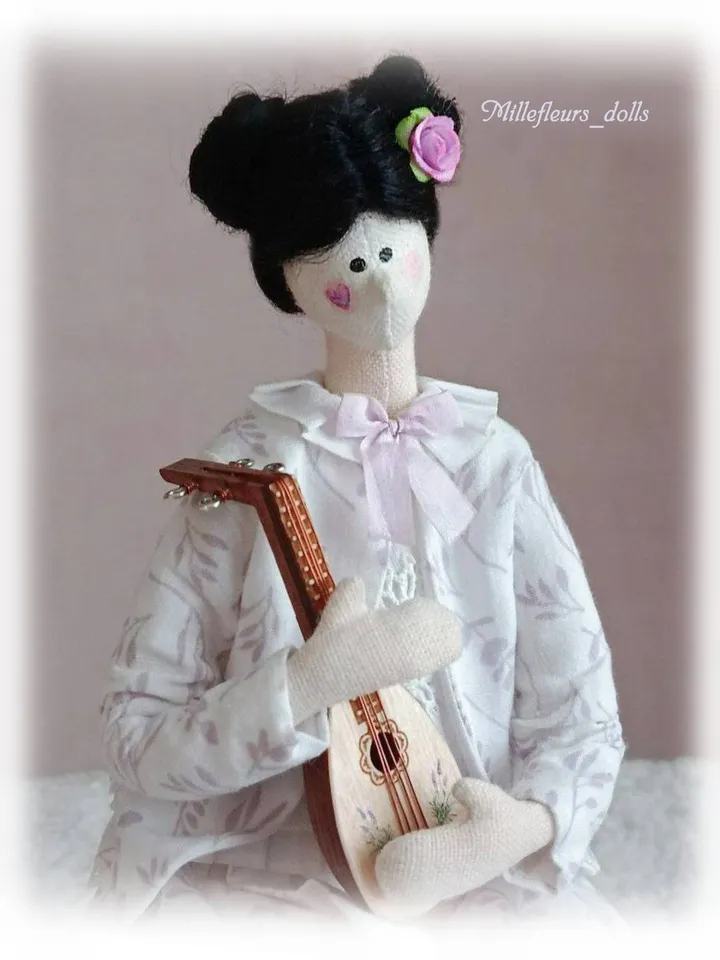 Author's doll made of Colombine fabric