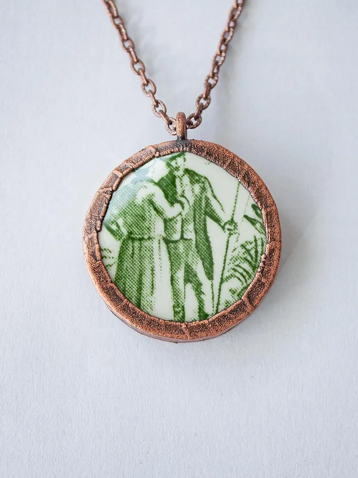 Unique handmade porcelain pendant in a copper frame made using the electroforming process