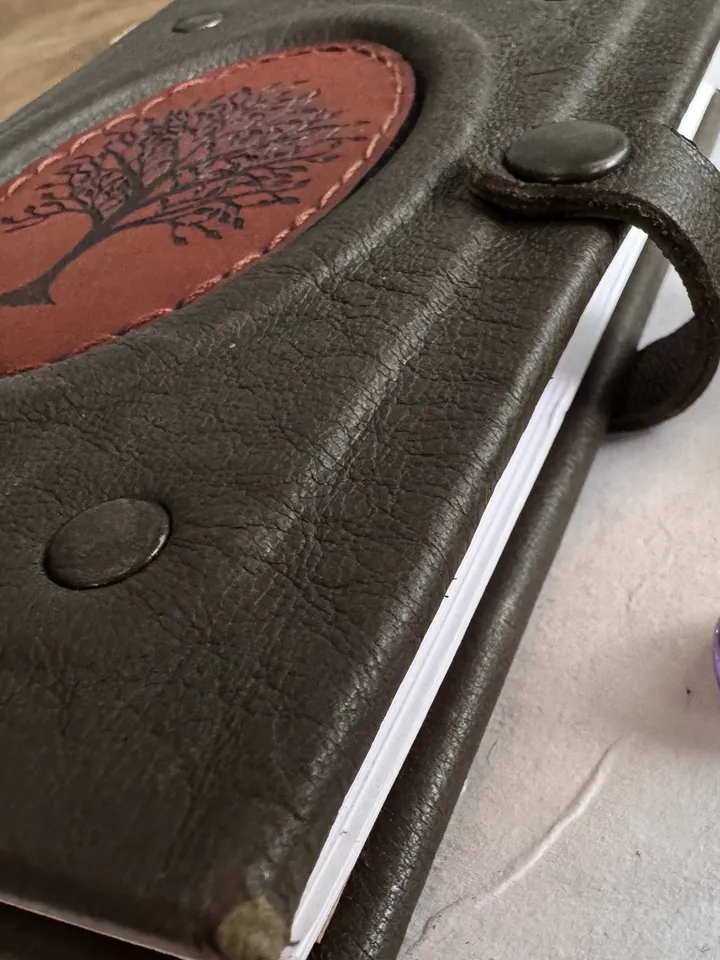 Notebook made of genuine suede with leather insert and wood engraving.