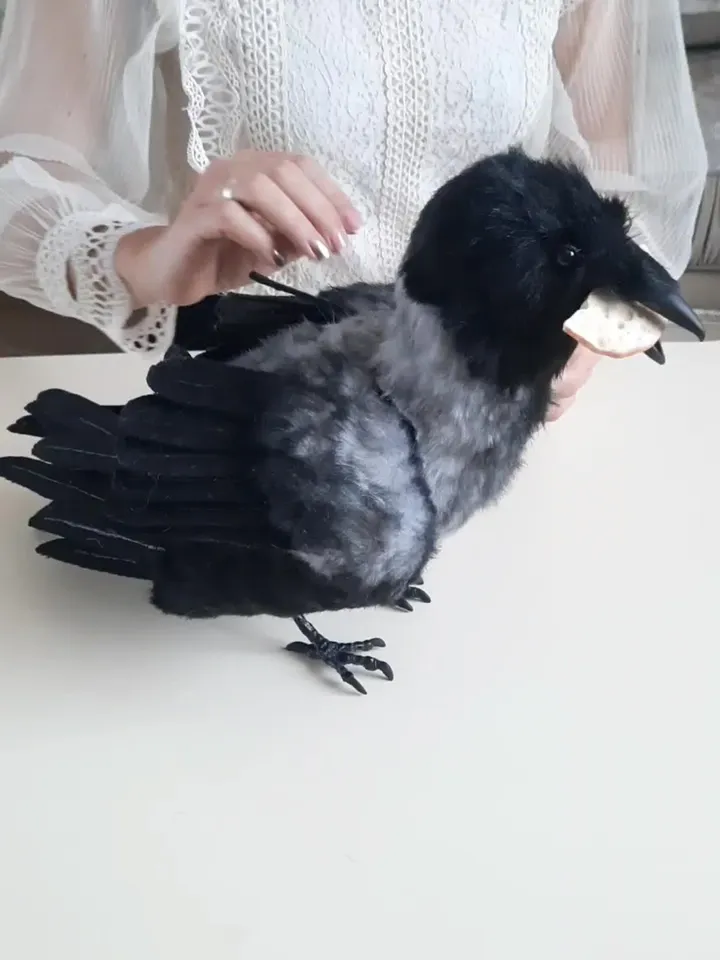 Grey crow with cheese realistic plush toy.