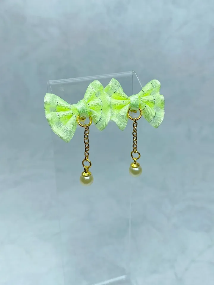Handmade bow earrings. Author's work. Bright jewelry.