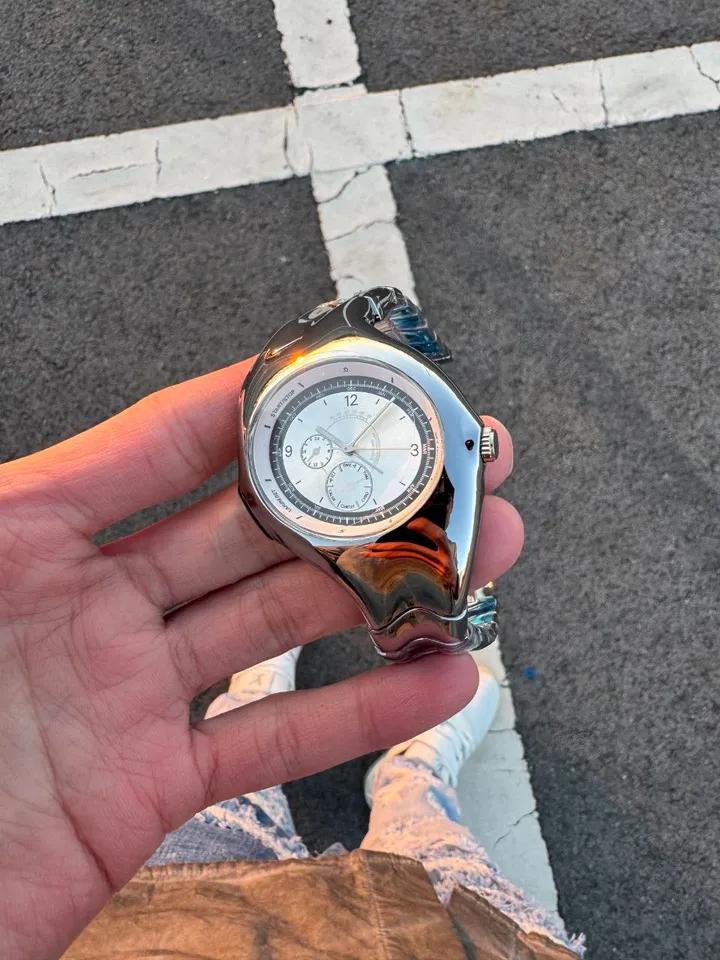 Nike Triax wristwatch: glossy silver case and dial