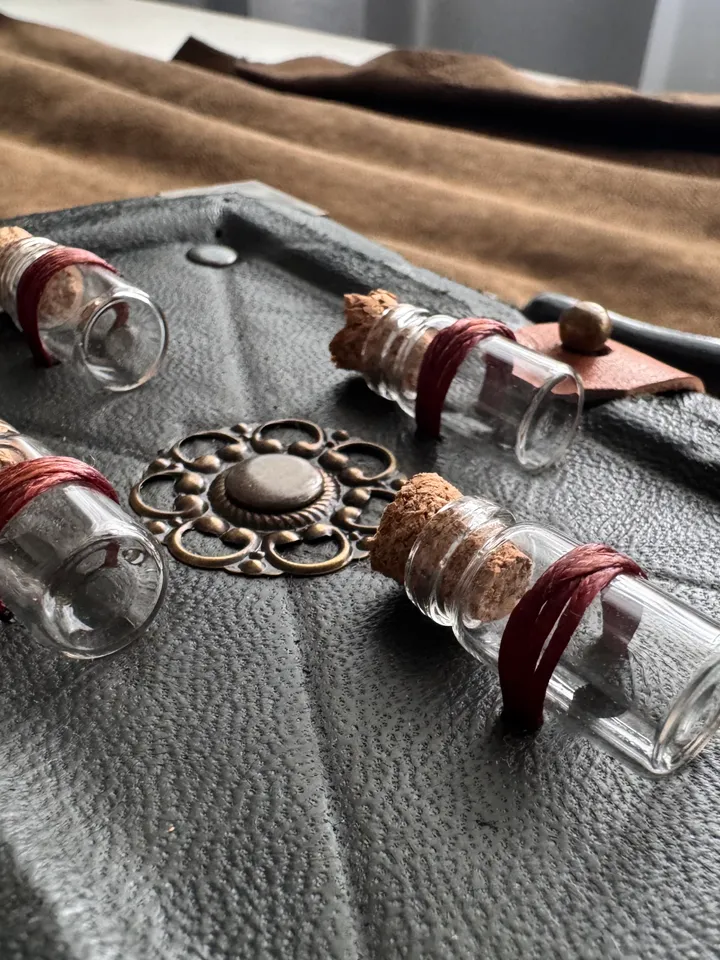 Genuine leather notebook with mini bottles on the cover. Grimoire, book of shadows, magical herbalist.