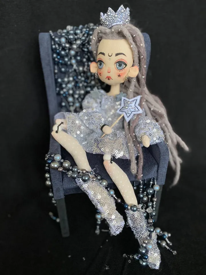 White Queen doll with dreadlocks and tattoos
