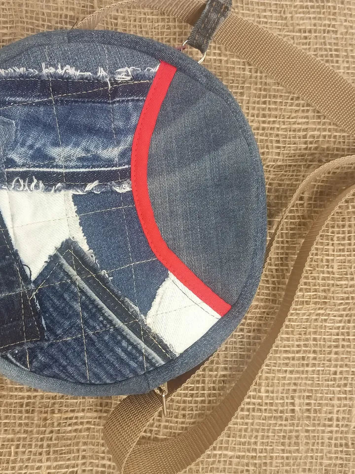 Round denim crossbody bag, for various necessary trifles, with 3 pockets and a long red strap 123 cm/48,4", cotton inside, d 19 cm/7, 5".
handbag for small things. Put your phone, wallet, glasses, keys in it and go for a walk / You will love it!