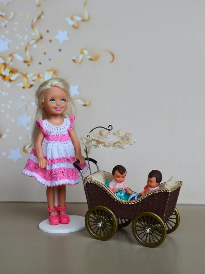 Miniature toy stroller for two small dolls. Handmade miniature stroller for small dolls.