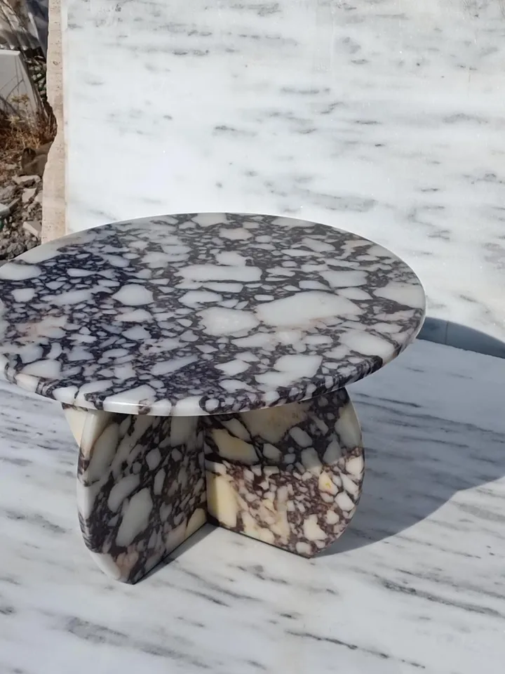 Calacatta Viola Coffee Table is Real Marble and everything is marble, including the Italian model handmade legs.