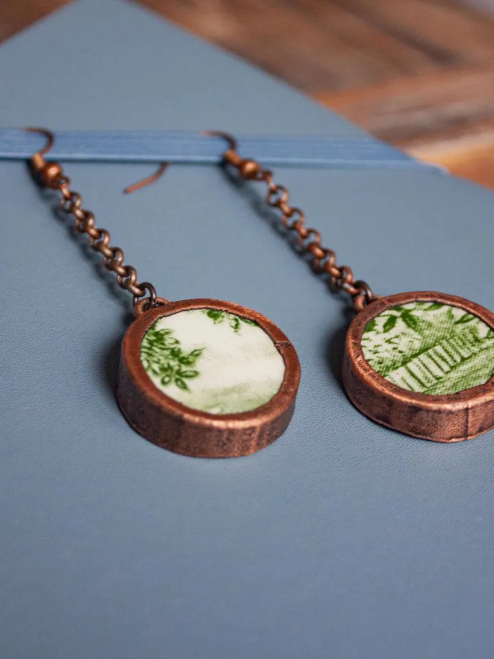 Unique handmade porcelain earrings in a copper frame made using the electroforming process