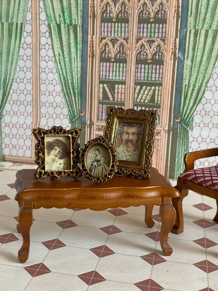 A set of photo frames for a dollhouse. Dollhouse miniature. 1:12. Dollhouse accessories.