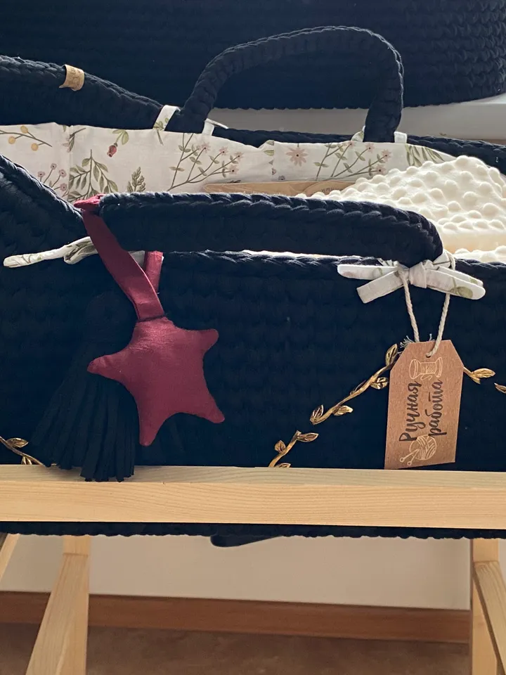 Knitted baby cradle