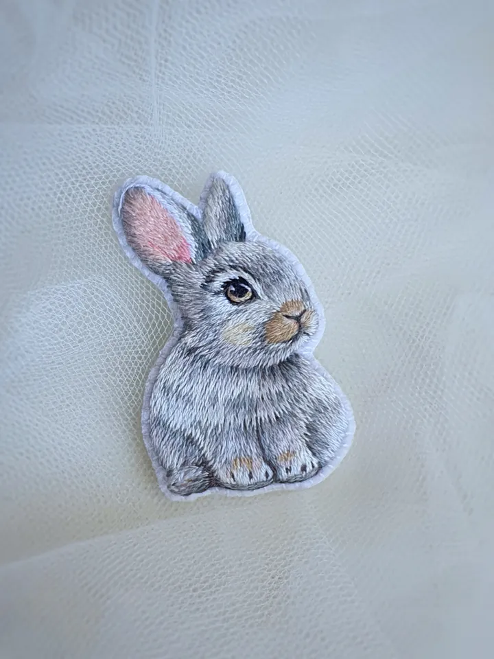 Tiny Bunny Brooch. An embroidered brooch in artistic satin stitch.