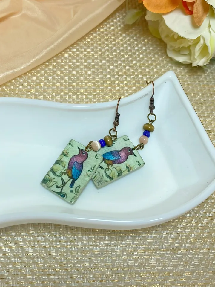 Vintage handmade earrings. Earrings with images of birds.