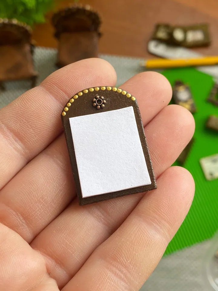 Dollhouse set. Inkwell with feather.