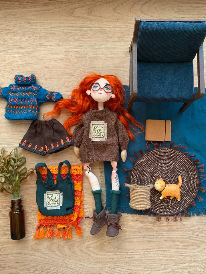 Red-haired doll with goblincore and cottagecore style with tattoos