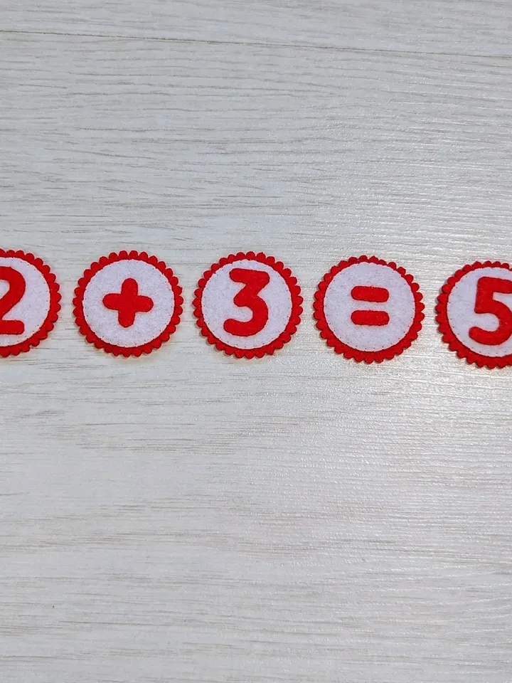 The figures are made of felt. Educational aid for children on learning to count. Addition and subtraction within 10.