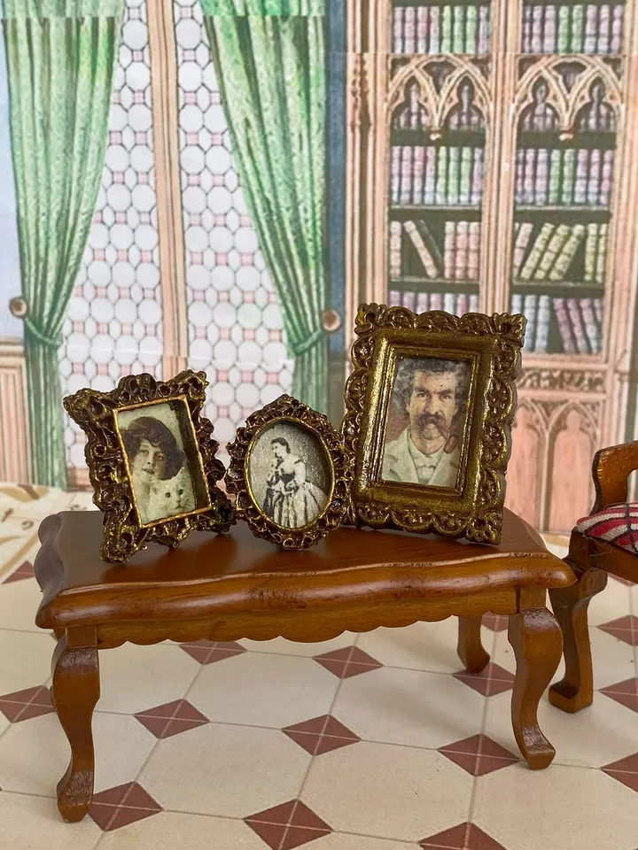 A set of photo frames for a dollhouse. Dollhouse miniature. 1:12. Dollhouse accessories.