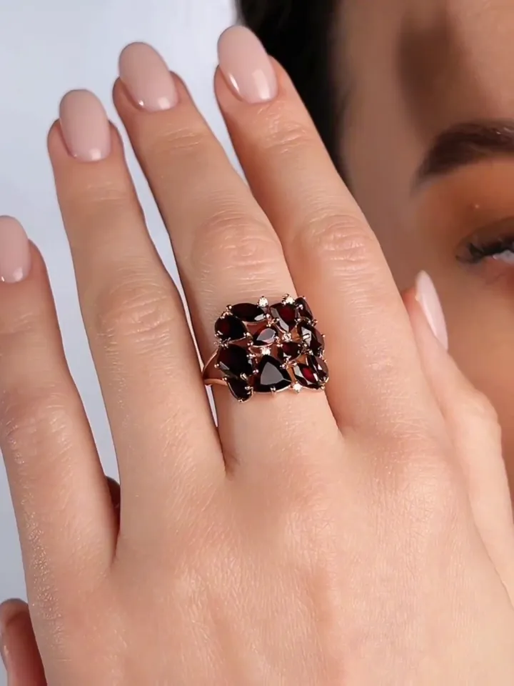 Ring gold plated silver 925 assay value with garnets