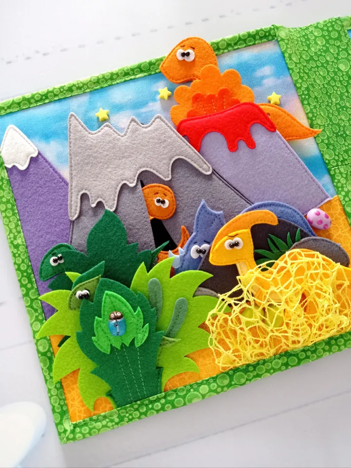 felt gaming tablet for children about the life history of different types of dinosaurs