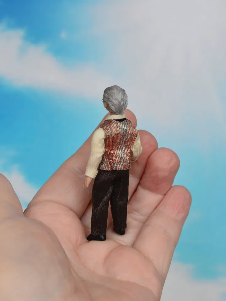 Man doll in 1/24 scale. Miniature doll for a dollhouse.