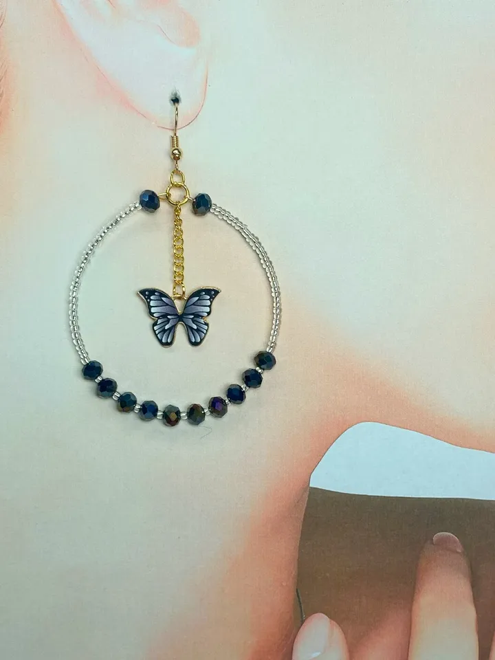Earrings with butterflies. Handmade jewelry. Individual design.