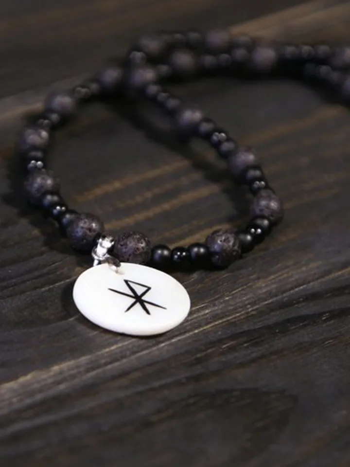 Raven or crow necklace with love rune on the other side. Nacre pearl pendant