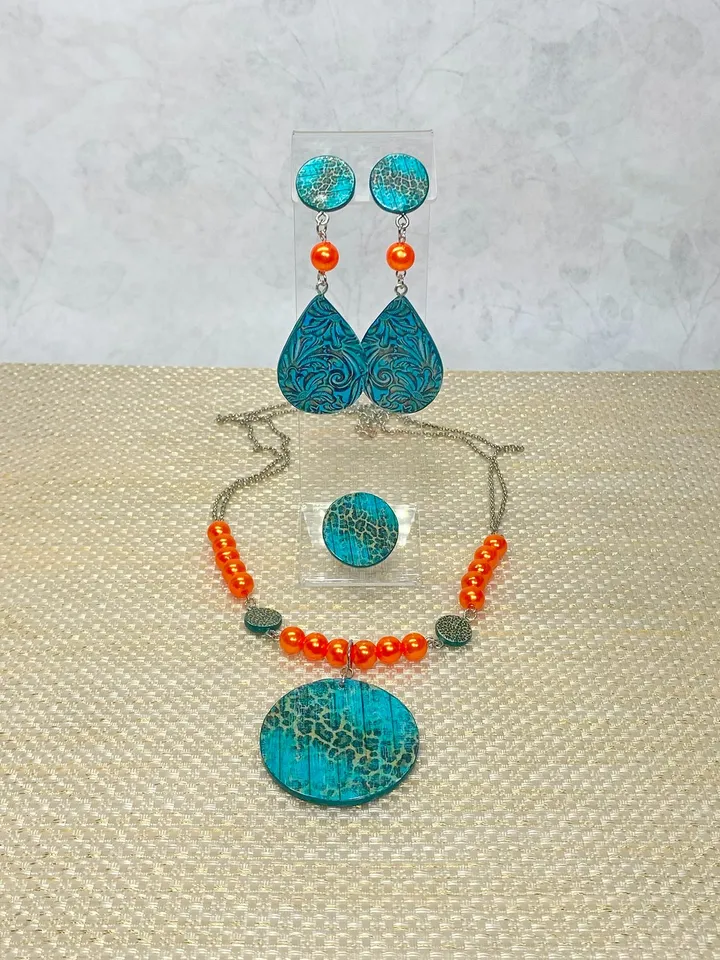 Bright set of handmade jewelry. Individual design.