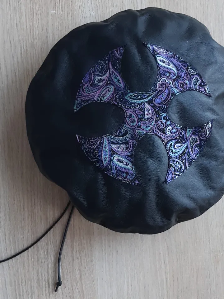 Beret of soft genuine leather with applique, decorated with a buckle. Leather hat for spring