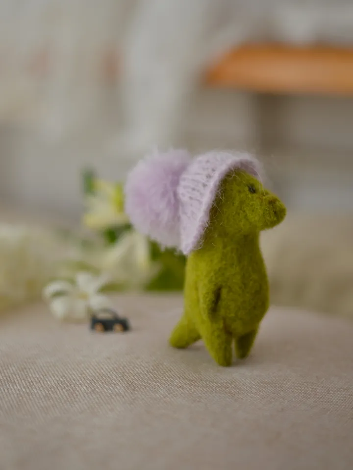 Handmade toy Crocodile Filia in a hat and with a wooden car
