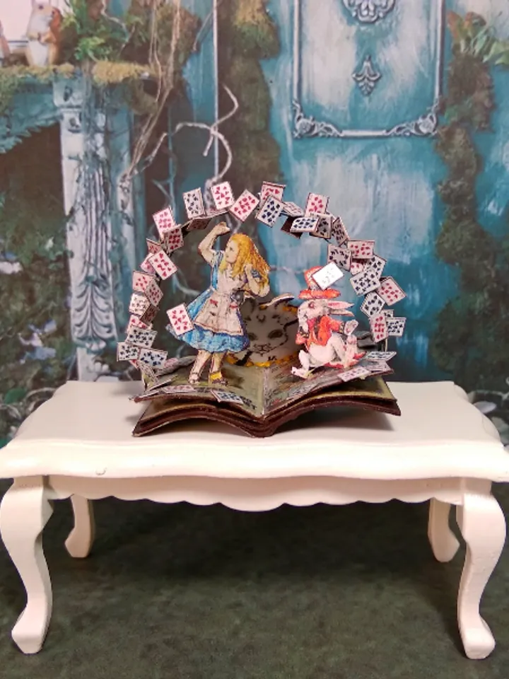 Open book. Dollhouse miniature.Miniature for a dollhouse.1:12 scale.