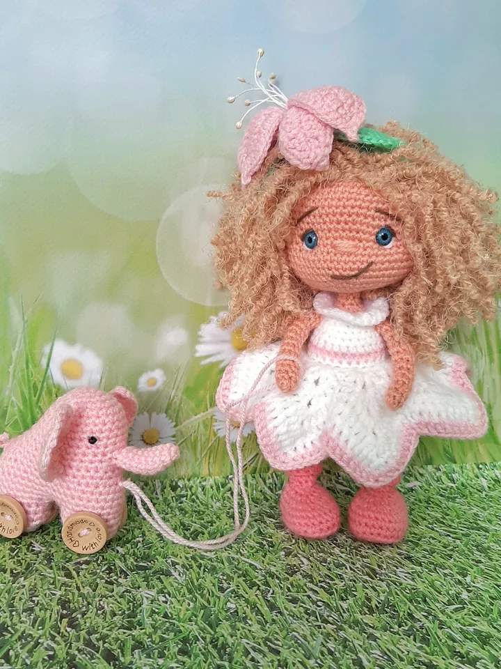 small doll in a white dress, flower girl doll