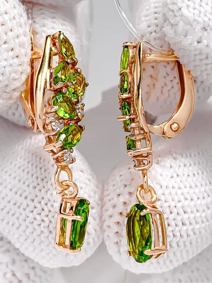 Earrings made of 925 silver (585 gold coating) long with chrysolite and cubic zirconia