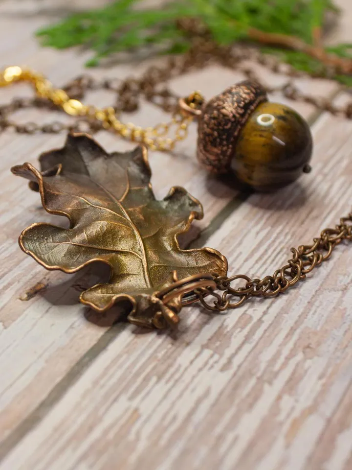 An original handmade electroformed copper pendant made from natural acorn caps in a single copy.