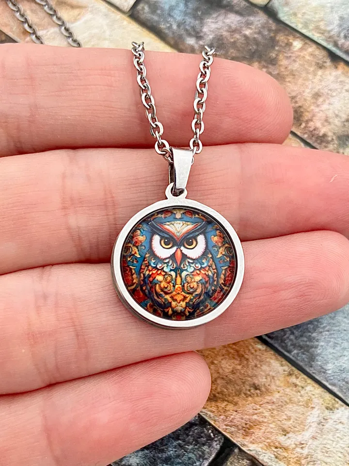 Owl, steel pendant with glass