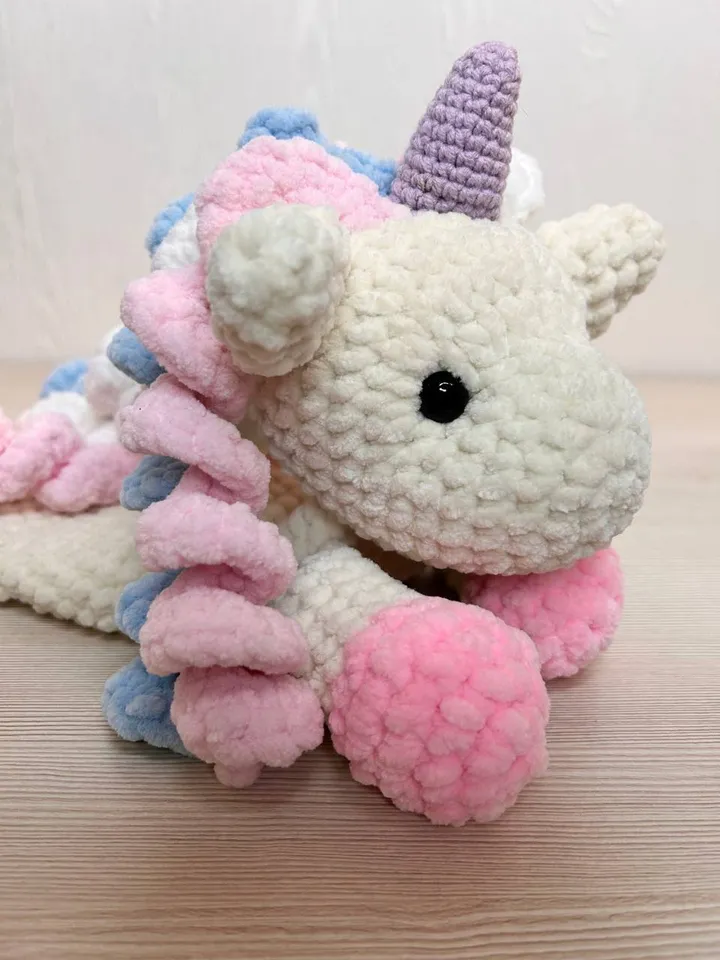 Crochet unicorn snuggler Handmade plushie toy for kids Unicorn cuddle stuffed toy