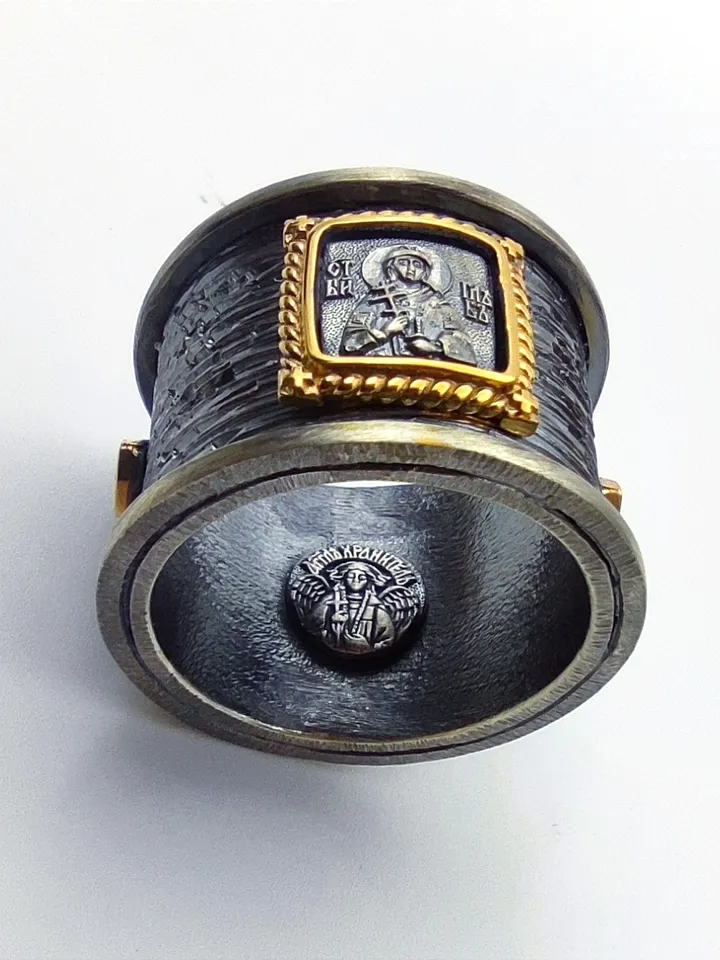 Gorgeous ring with faces of saints