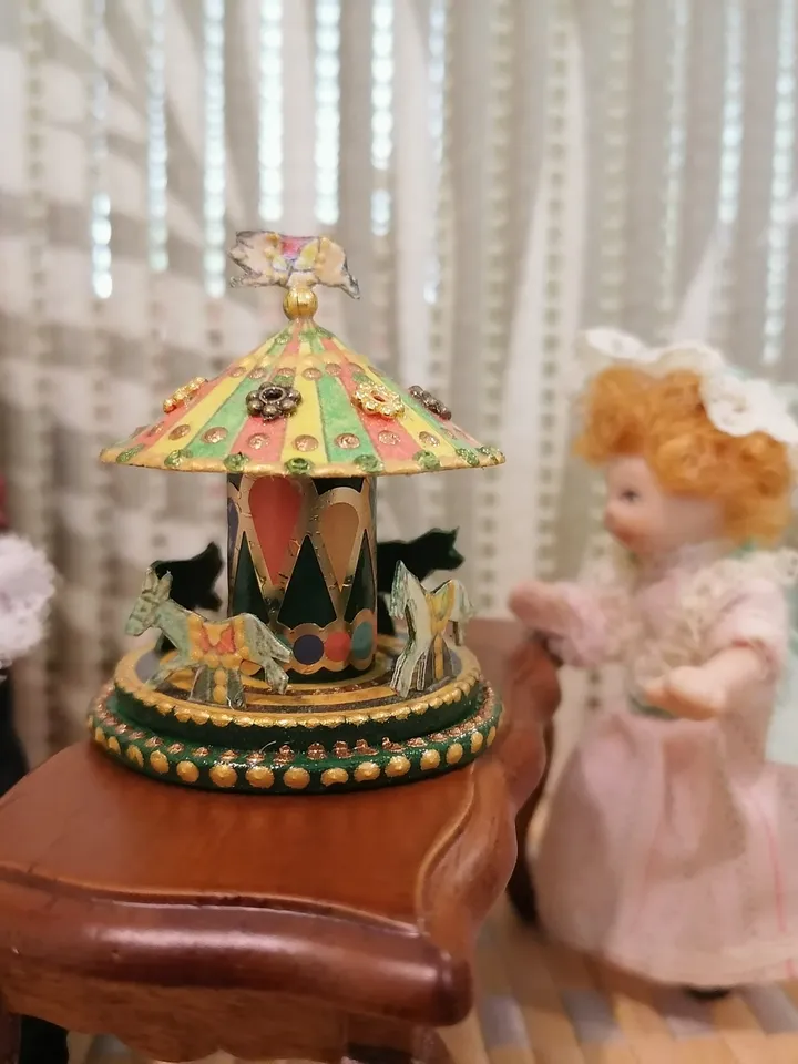 Miniature carousel. Dollhouse miniature.1:12 scale.