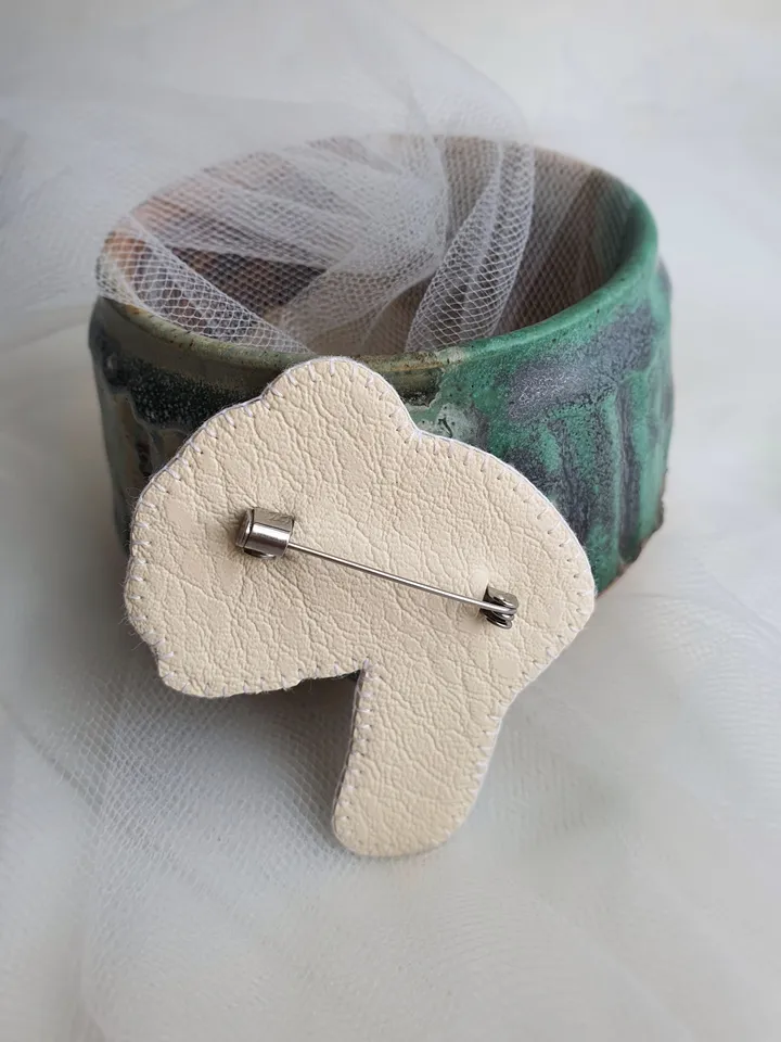 Sleeping Tiger Cub Brooch. Hand-embroidered with satin stitch