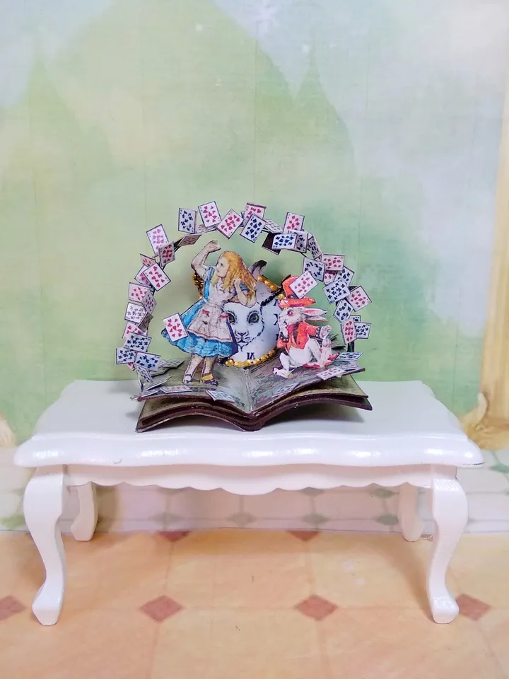 Open book. Dollhouse miniature.Miniature for a dollhouse.1:12 scale.