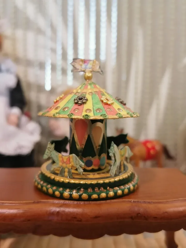 Miniature carousel. Dollhouse miniature.1:12 scale.