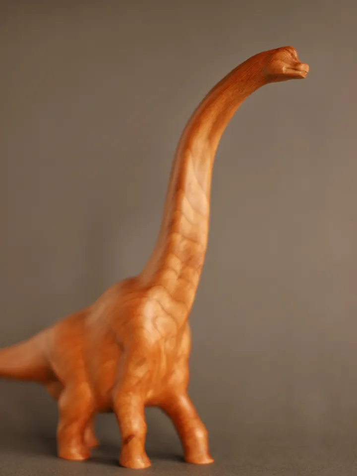 Wooden hand carved dinosaur brachiosaurus