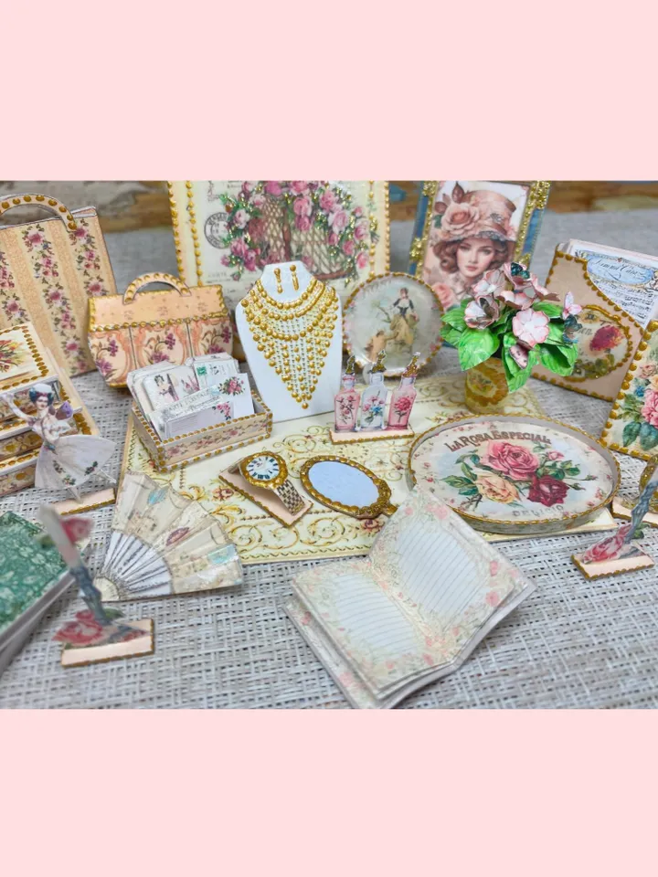 A set of accessories in beige and pink to fill the interior of a dollhouse in 1:12 scale.