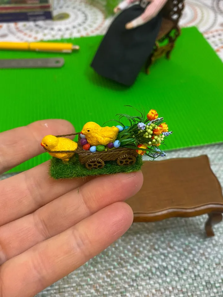 Easter miniature. Two chickens with a cart and a bouquet of flowers.1:12