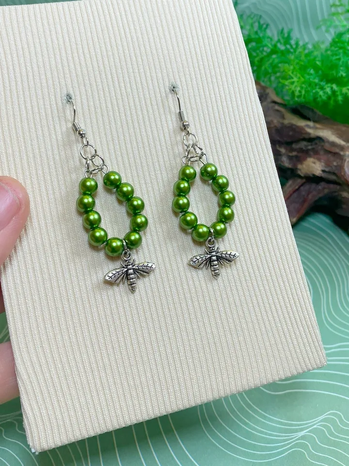 Earrings with green flies. Handmade jewelry.