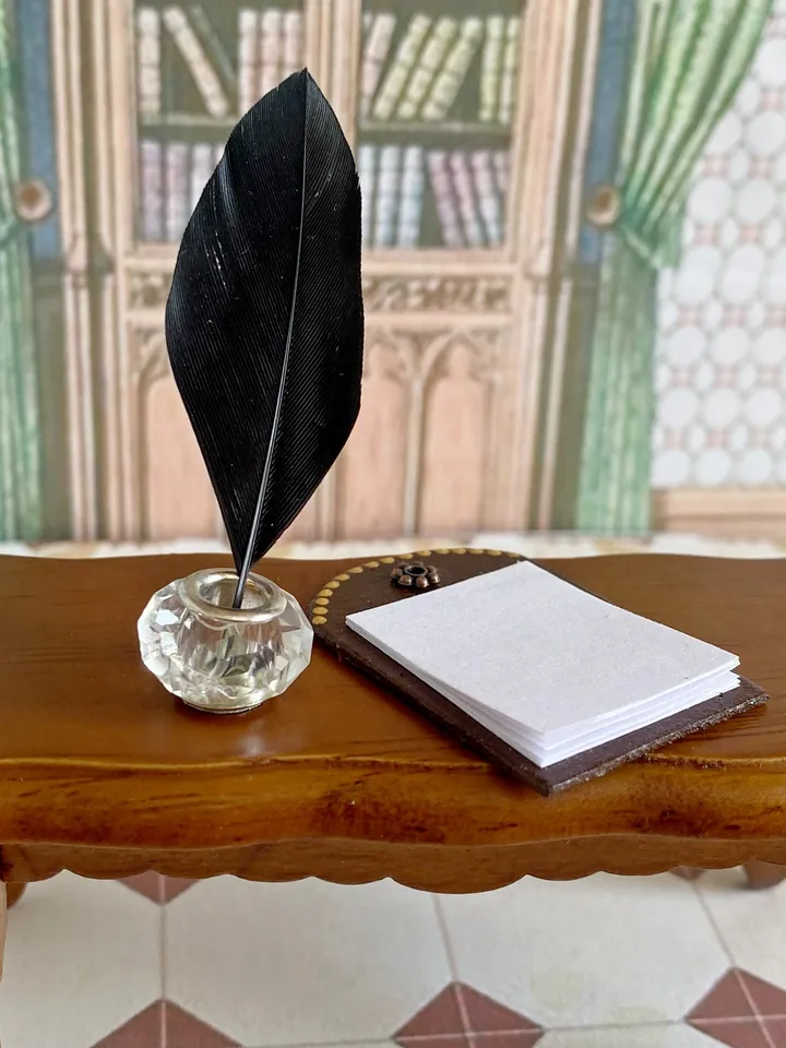 Dollhouse set. Inkwell with feather.