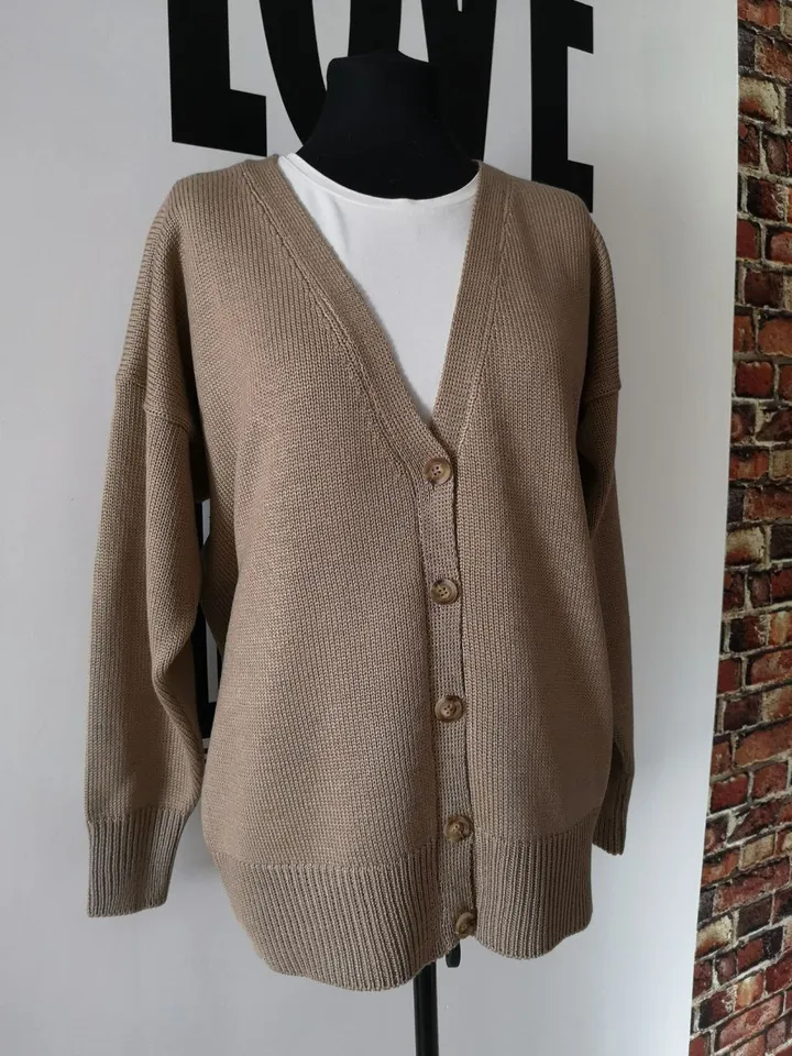 Knitted merino cardigan.